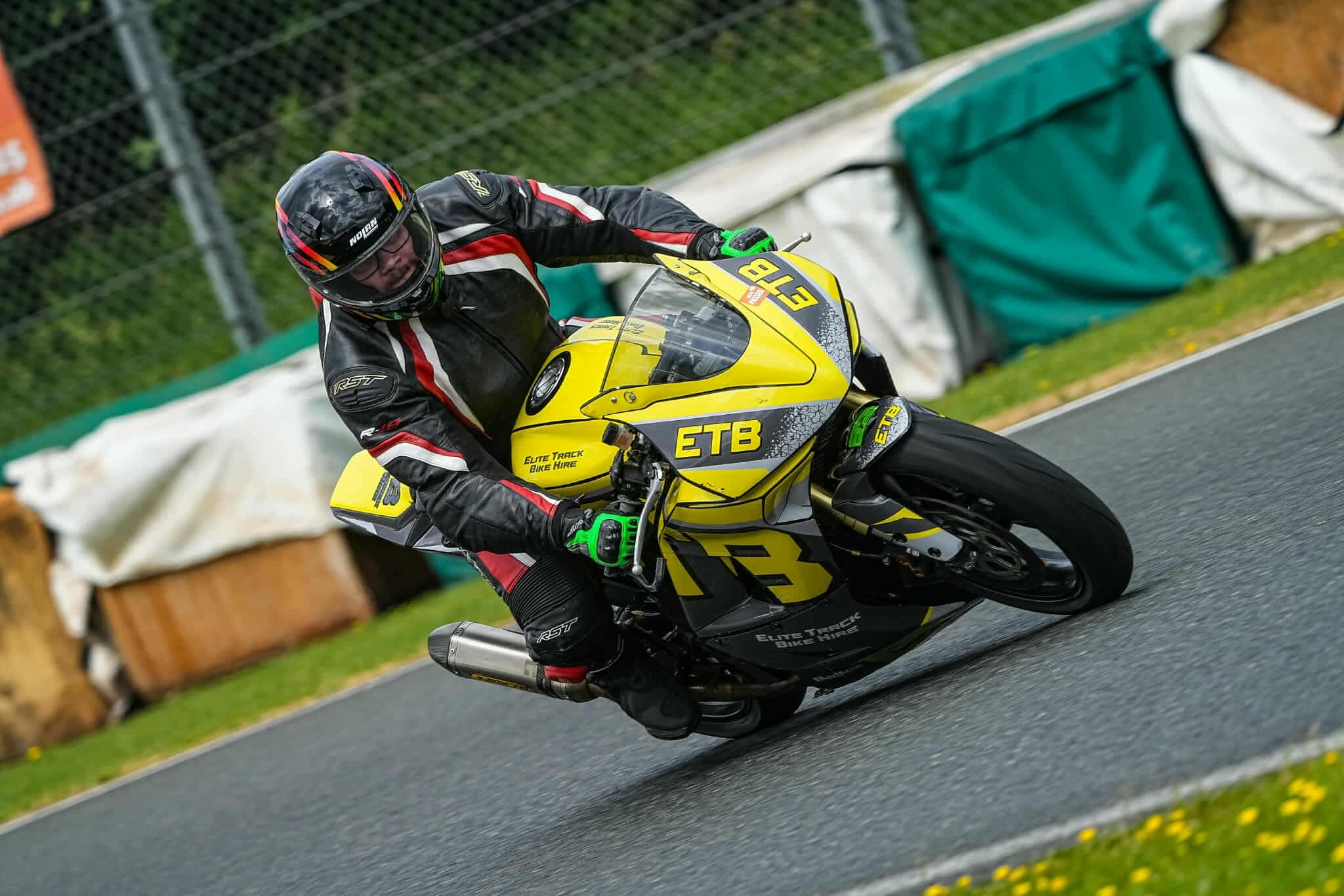 A track-ready ETB bike cornering on circuit